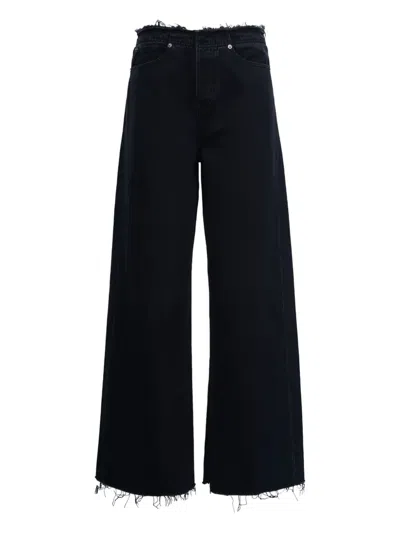 FRAME FRAYED JEANS