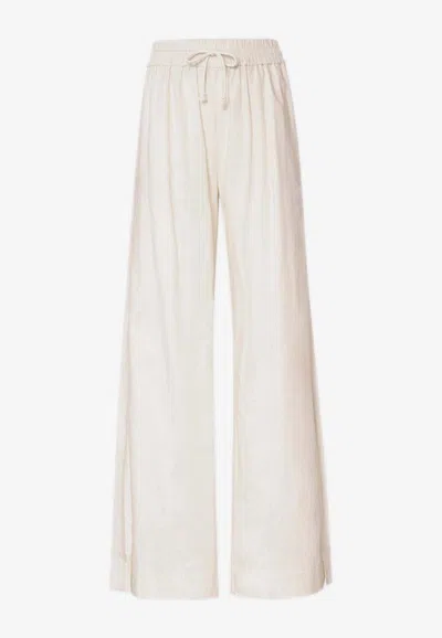 Frame High-rise Wide Lounge Pants In Cream