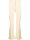 Frame Le Mini Boot Flared Trousers In Yellow