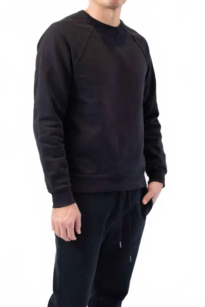 Frame Long Sleeve Raw Edge Service Crewneck Top In Faded Noir In Black
