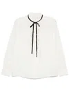 Frame Velvet Tie Ruffle Blouse In Cream In White