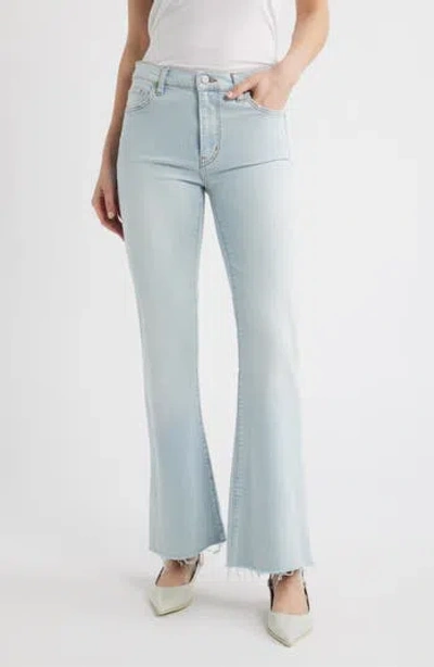 Frame The Icon Raw Hem Flare Jeans In Blue