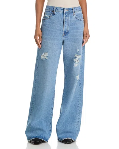 Frame The Loose High Rise Low Slung Wide Leg Jeans In Sundrop In Blue