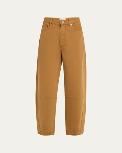 Frame The Twisted Barrel Jeans In Brown