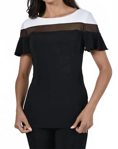 Frank Lyman Brenlynn Ruffle Short Sleeve Knit Top With Sheer Panel In Black And Off White In Multi