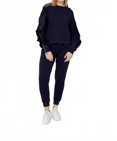 Frank Lyman Maeve Ruffle And Zipper Long Sleeve Top In Midnight Blue
