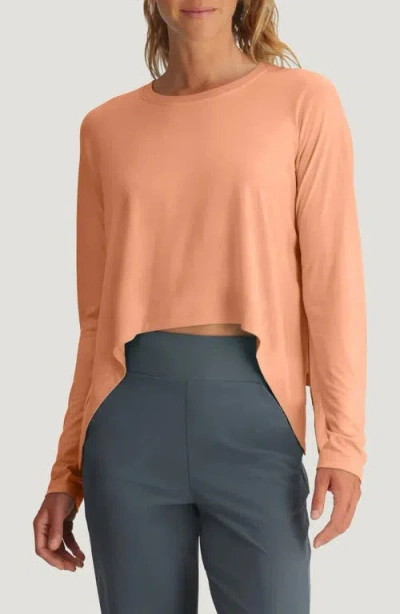 Free Fly Crop Long Sleeve Top In Orange
