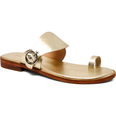 Free People Barcelona Toe Loop Sandal In Gold Metallic