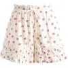 Shop Free People Cambridge Floral Ruffle Shorts In Ivory Combo