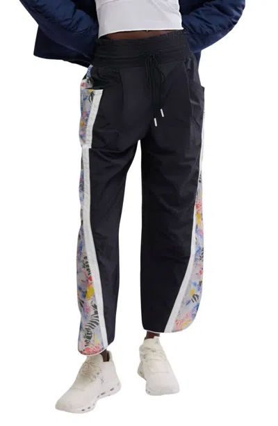 FREE PEOPLE CHAMP IS HERE DRAWSTRING PANTS IN MYSTIC FLORAL COMBO