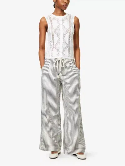 Free People Dakota Cinched Striped Denim Trousers In Ivory / Navy In Multi