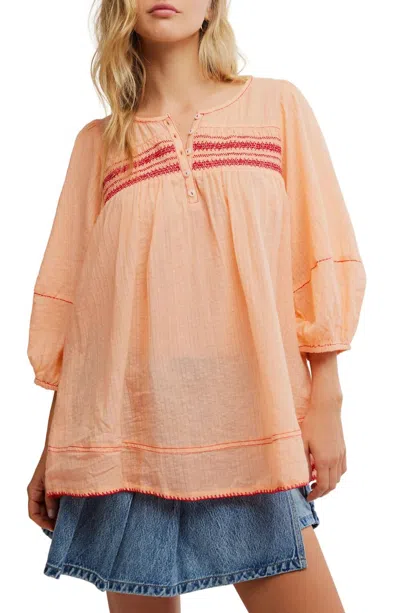 Free People Dylan Smocked Tunic In Tropical Peach Combo In Pink