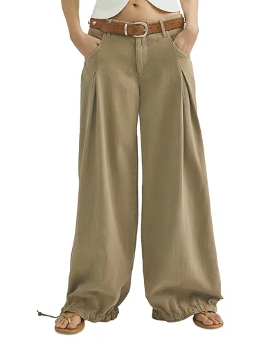 Free People Essential Lotus Wide Leg Jeans In Beige In Gold