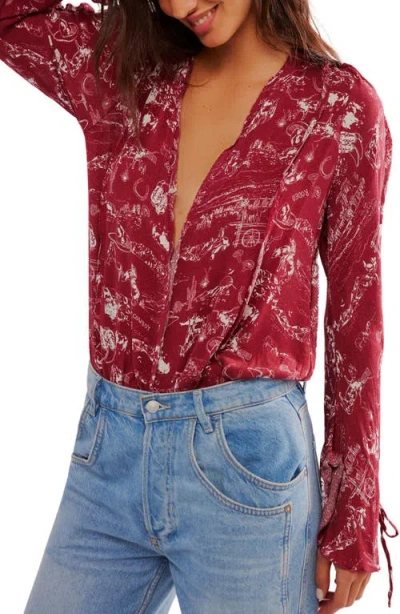 Free People Everythings Rosy Bodysuit In Western Print
