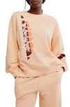 Free People Fp Movement All Star Oversize Graphic Sweatshirt In Pastel Peach Sport
