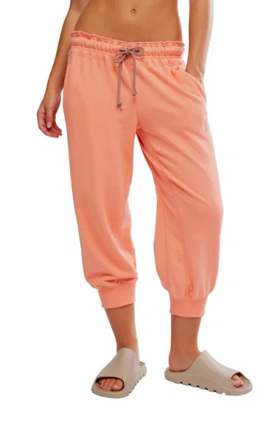 Free People Fp Movement Flutter Crop Joggers In Orange