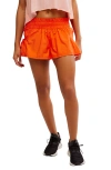 Free People Fp Movement Get Your Flirt On Shorts In Orange