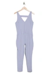 Free People Fp Movement Never Better Strappy Back Jumpsuit In Platinum