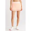Free People Fp Movement Rally Pleated Miniskort In Orange