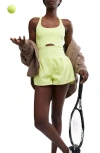 Free People Fp Movement Righteous Runsie Romper In Yellow
