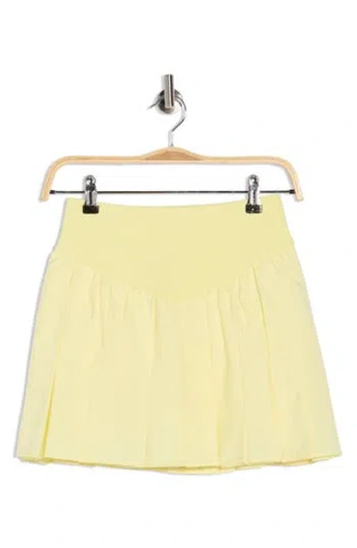 Free People Fp Movement Swing Of Things Pleated Skort In Yellow