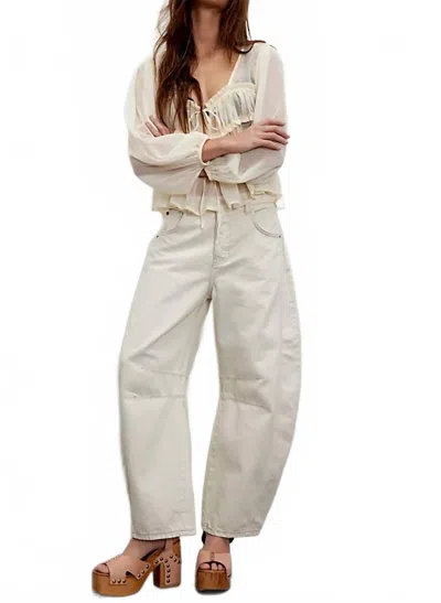 FREE PEOPLE GOOD LUCK MID RISE BARREL JEANS IN SUNSETTER
