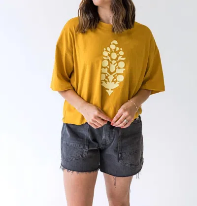 Free People Inspire Buti Logo Tee In Ember Glow/daylight In Gold