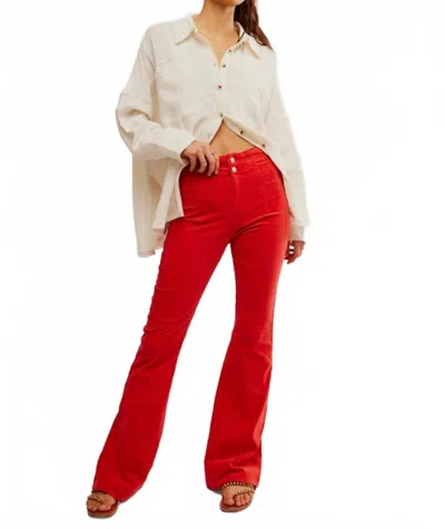 Free People Jayde Cord Flare Jeans In Molten Lava In Red