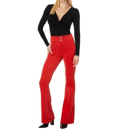 FREE PEOPLE JAYDE CORD FLARE PANTS IN MOLTEN LAVA