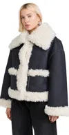 Free People Kiki Faux Leather Jacket With High Pile Fleece Trim In Black Combo
