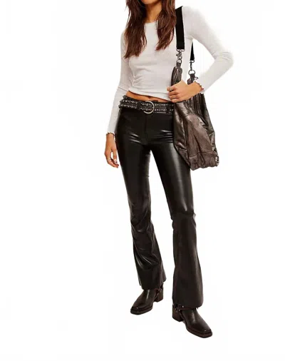 FREE PEOPLE LEVEL UP VEGAN FLARE SLIT PANTS IN BLACK