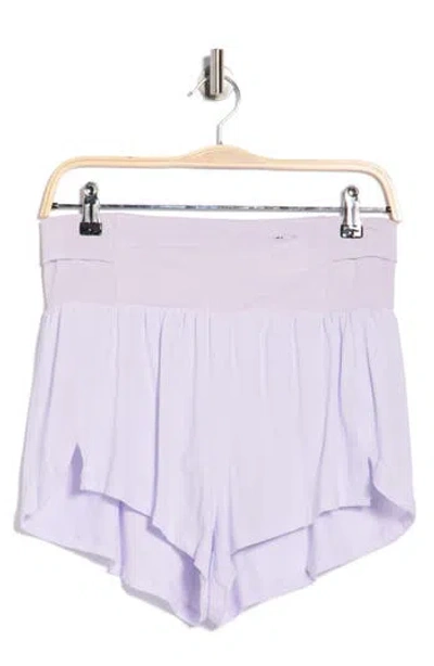 Free People Light As Air Run Shorts In Purple