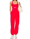 FREE PEOPLE MOVEMENT RIGHTEOUS ONESIE IN RED