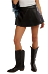 Free People Paradise Found Faux Leather Miniskort In Black