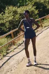 Free People Righteous Runsie Romper In Black Grape In Blue