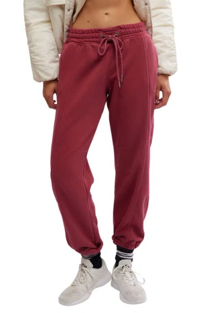 Free People Sprint To The Finish Seamed Sweatpants In Sour Cherry