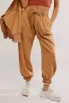 Free People Sprint To The Finish Sweatpants In Camel