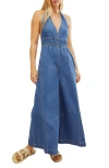 FREE PEOPLE SUNRAYS DENIM HALTER JUMPSUIT