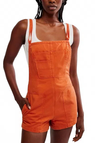 Free People Tough Love Shortall Romper In Cinnamon Stick In Orange