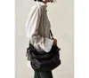 FREE PEOPLE WE THE FREE SABINE SLOUCHY BAG IN WASHED BLACK
