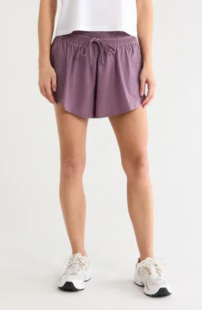 Free People Wild Bloom Performance Shorts In Purple