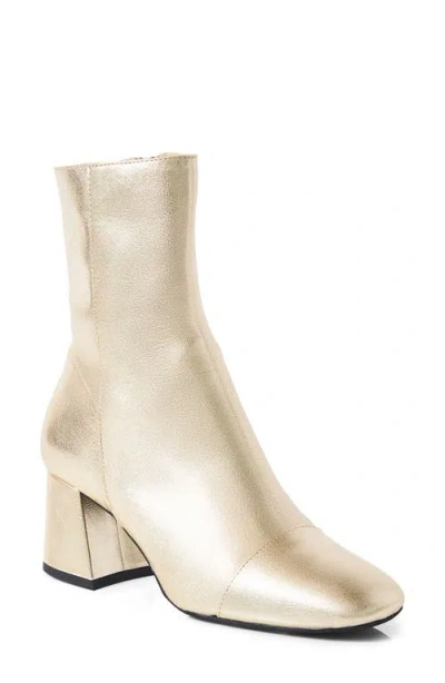 Free People Wisteria Cap Toe Bootie In Champagne Metallic