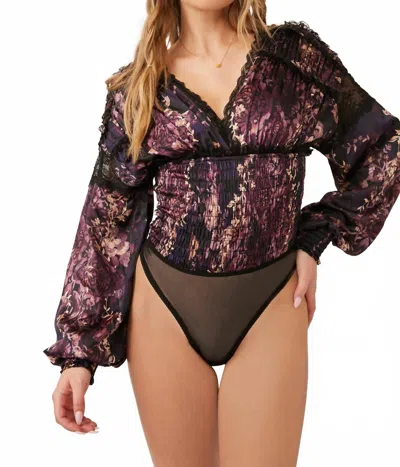 Free People Worth The Wait V-neck Long Sleeve Bodysuit In Black Combo In Purple