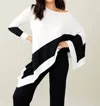 French Kyss Soft Stretch Asymmetrical Top In Bleach/black In White