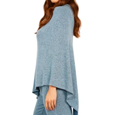 French Kyss Solid Asymmetrical Poncho In Wind In Blue