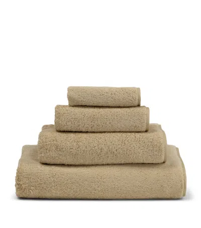 Frette Cotton Unito Hand Towel In Sand