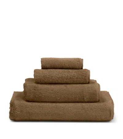 Frette Unito Hand Towel In Brown