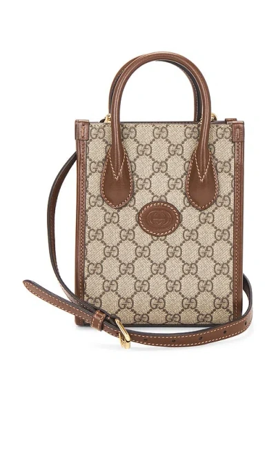 Fwrd Renew Gucci Retro Interlocking G Mini Tote Bag In Brown