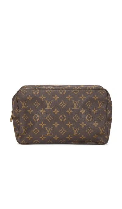 Fwrd Renew Louis Vuitton Monogram Trousse Toilette 28 Pouch In Brown