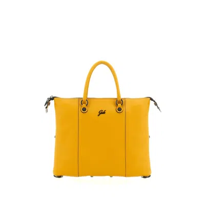 Gabs Structured Yellow Leather Handbag With Transformative Features In Orange